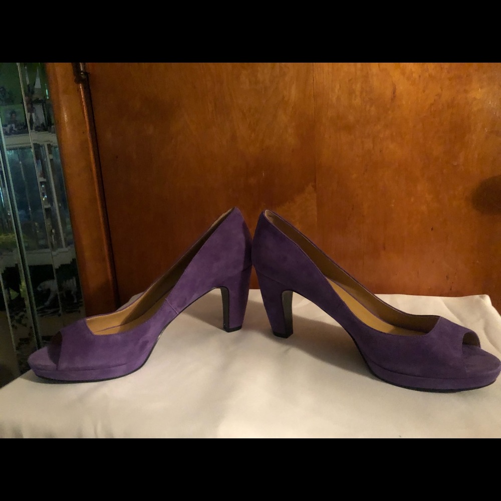 Nine West purple suede peep toe platforms.